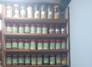 Shelves of Ayurvedic preparations at the clinic